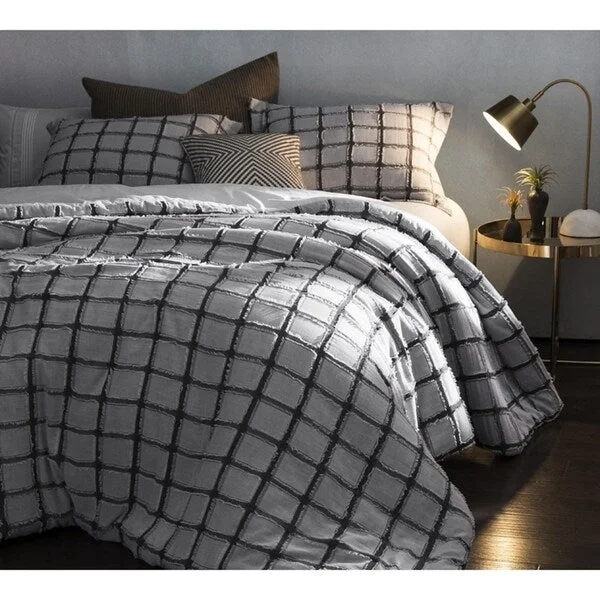 Goose down comforters known for their superior quality and insulationBYB Frayed Edgings Comforter - Black/White Goose down comforters known for their superior quality and insulationBYB Frayed Edgings Comforter - Black/White