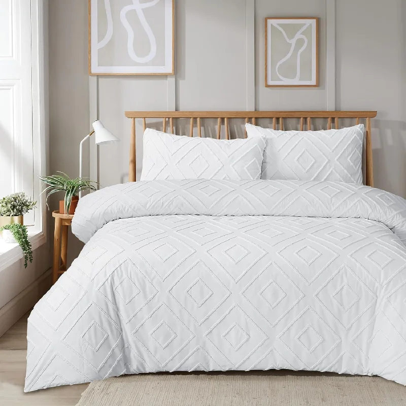 Solid - colored duvet covers in classic colors like white, black, and navy for a timeless lookComo Tufted Duvet Cover Set with Pillowcases Grey Natural White Elegant Easy-Care Bedding Single Double King Sizes by OLIVIA ROCCO