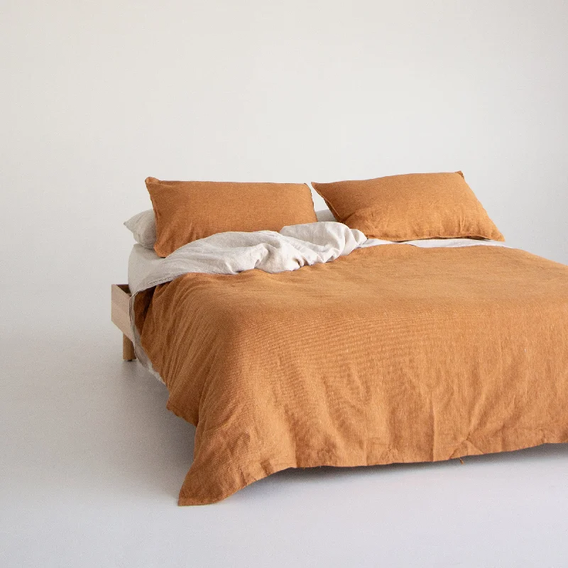 Solid - colored duvet covers in classic colors like white, black, and navy for a timeless lookEuropean Linen Duvet - Toffee Pinstripe