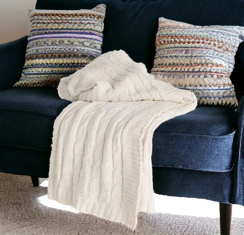 Acrylic blankets for a soft and affordable alternativeIvory Knitted 100% Cotton Throw Blanket