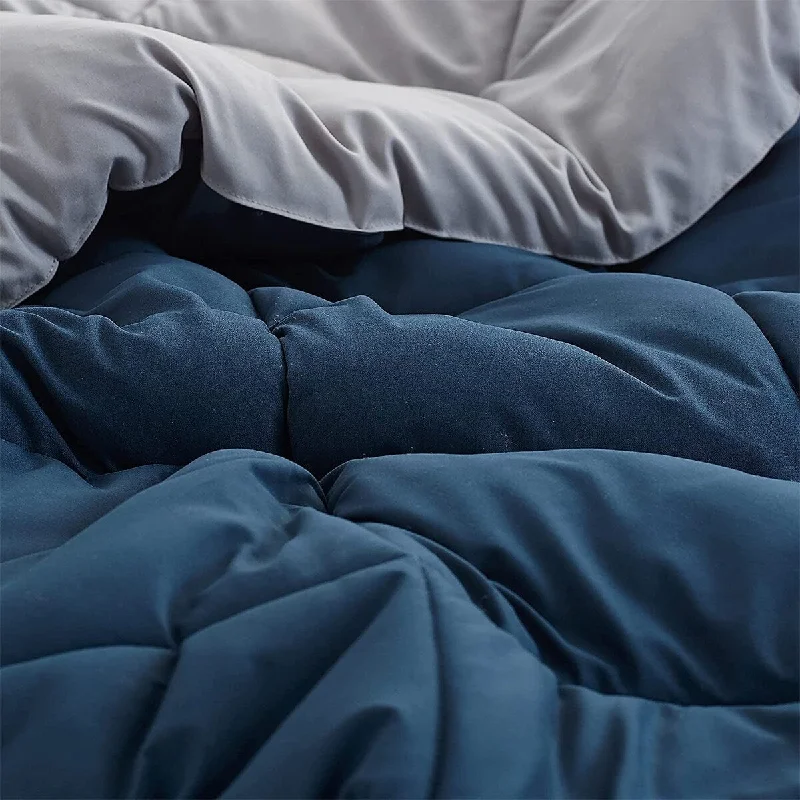 Goose down comforters known for their superior quality and insulationNightfall Navy/Alloy Reversible Comforter - Oversized Bedding Goose down comforters known for their superior quality and insulationNightfall Navy/Alloy Reversible Comforter - Oversized Bedding