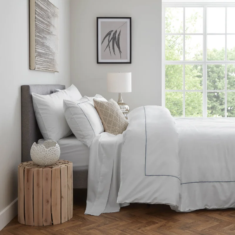 Solid - colored duvet covers in classic colors like white, black, and navy for a timeless lookOrganic Cotton Sateen Duvet Cover - Midnight Navy/White