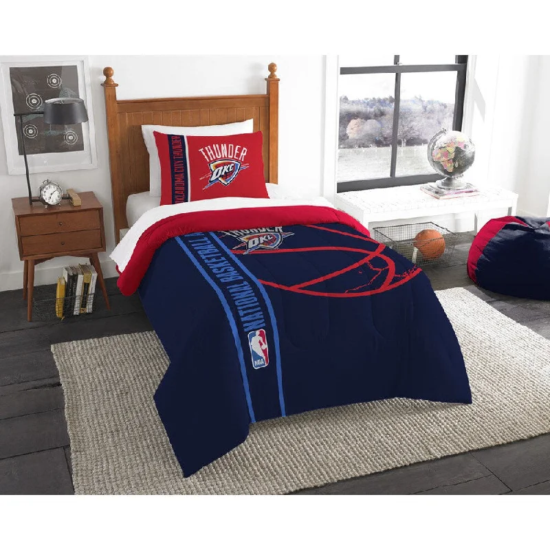 Synthetic - filled comforters like polyester for affordability and hypoallergenic propertiesThe Northwest Company NBA Oklahoma City Thunder Twin 2-piece Comforter Set Synthetic - filled comforters like polyester for affordability and hypoallergenic propertiesThe Northwest Company NBA Oklahoma City Thunder Twin 2-piece Comforter Set