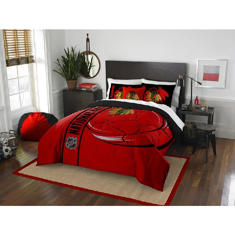 Synthetic - filled comforters like polyester for affordability and hypoallergenic propertiesThe Northwest Company Official NHL Chicago Blackhawks Full Applique 3-piece Comforter Set Synthetic - filled comforters like polyester for affordability and hypoallergenic propertiesThe Northwest Company Official NHL Chicago Blackhawks Full Applique 3-piece Comforter Set